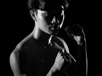 Silhouette of a person in a power stance.